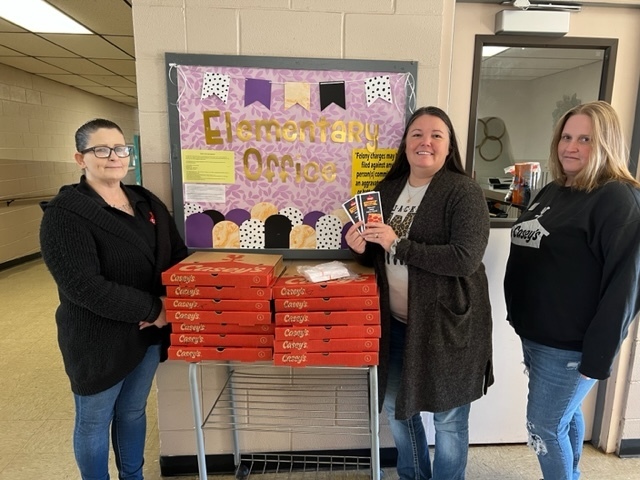 staff with donated pizza