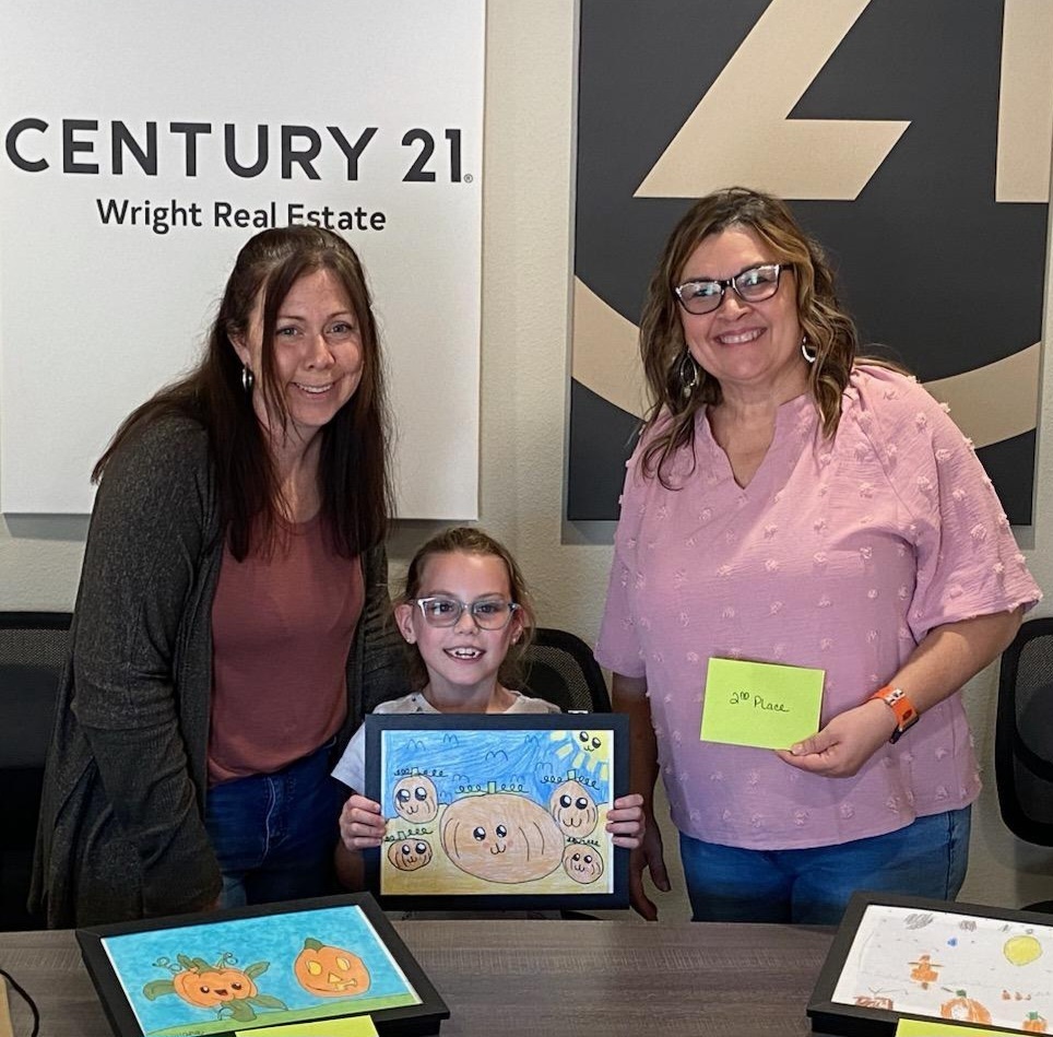 Congratulations, to Brenley McGaugh for placing 2nd place in the Century 21 Art Contest. Brenley holding award with Ms. Sanders and representative from Century 21.